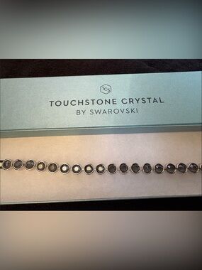 Touchstone Crystal Smoky Gray Faceted Crystal
Necklace
